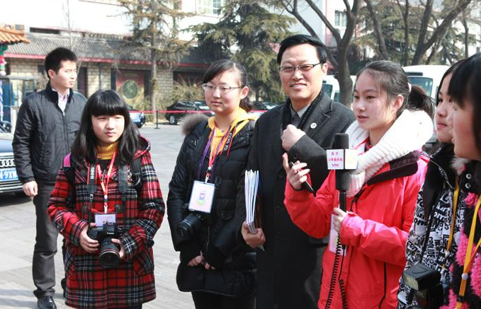 我区举行学习习近平同志重要讲话专题报告会